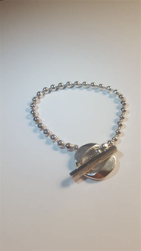 gucci bracelet fake or real